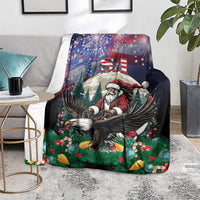 Christmas blanket on rug showing Santa and eagle over pine branches and ornaments