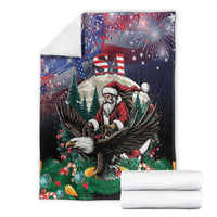 Folded Christmas blanket with Santa, eagle, USA stars, and fireworks; includes rolled towels