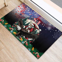 Black rubber Christmas doormat showing Santa riding an eagle over green holiday foliage