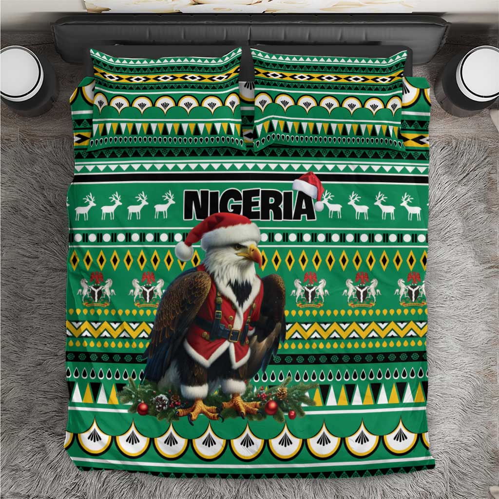 Green bedding set top view: eagle-Santa and Nigeria text on comforter with two patterned pillows
