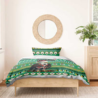 Green bedding set with eagle-Santa artwork and Nigeria text on duvet, with matching pillowcases
