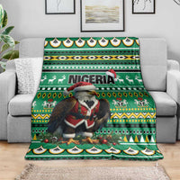 Green Nigeria Christmas blanket with Santa eagle, decorative borders, and scenic animals