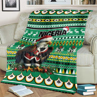 Green Nigeria Christmas blanket with Santa eagle and tribal stripes, borders, and motifs