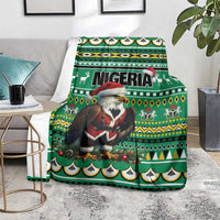 Green Christmas blanket featuring Nigeria text, Santa eagle and animal motifs
