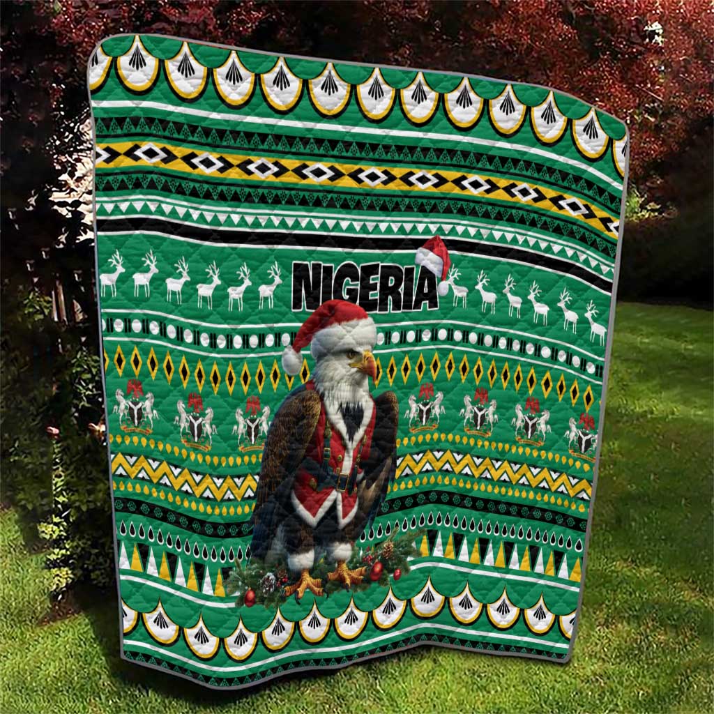 Green quilt featuring Eagle Santa, Nigeria wordmark, reindeer rows, and patterned bands