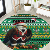 Green round carpet featuring eagle Santa, Nigeria banner text, and festive African motifs