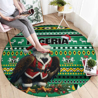 Green round carpet with eagle Santa, Nigeria text, and African pattern border