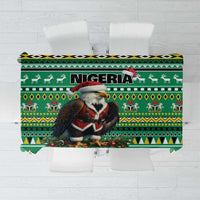 Green tablecloth with eagle and Santa graphic, patterned borders and 'Nigeria' text