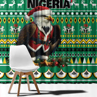 Green Christmas curtain with large eagle-and-Santa character centered on panel