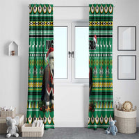 Green Christmas curtains with eagle-and-Santa graphic and patterned border scallops