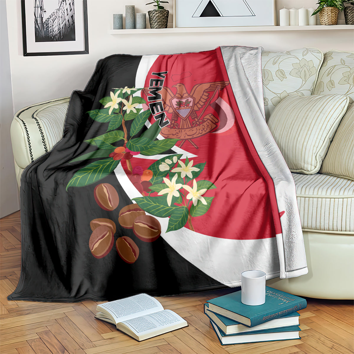 Red, black, and white Yemen flag-style blanket draped over sofa with floral crest art.