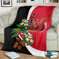 Yemen flag-style blanket with red, black, and white; floral and eagle crest print.