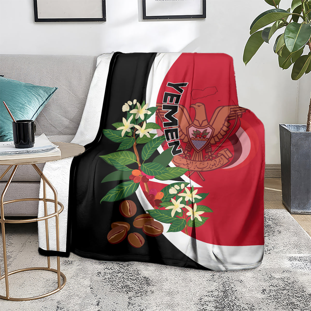 Red and black Yemen flag-style blanket on couch, white curves and crest graphics.