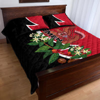 Red and black quilt bed set on wooden bed with Yemen emblem, flowers, and diagonal text