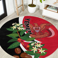 Round carpet with red and black Yemen unification design and 'YEMEN' lettering