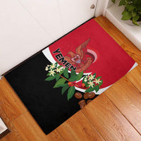Red and black Yemen Unity Day rubber doormat with Yemen emblem and floral design