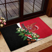 Red and black Yemen Unity Day rubber doormat with central emblem and leafy flowers