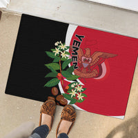 Red and black Yemen Unity Day rubber doormat with emblem, flowers, and coin accents
