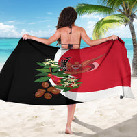 Red and black flag-style sarong draped wide, featuring Yemen emblem and plants