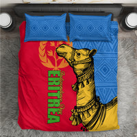 Bedding set with two blue geometric pillowcases and red/yellow duvet with camel artwork