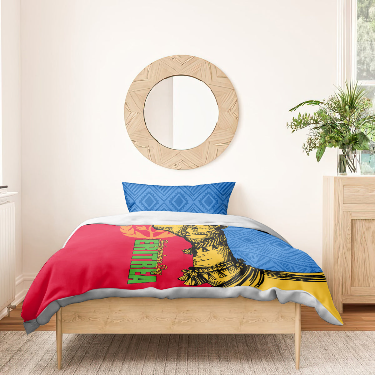 Bedding set with blue geometric pillow and red duvet featuring yellow camel and green text