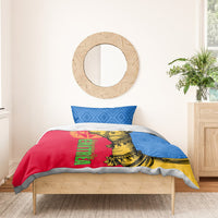 Bedding set with blue geometric pillow and red duvet featuring yellow camel and green text