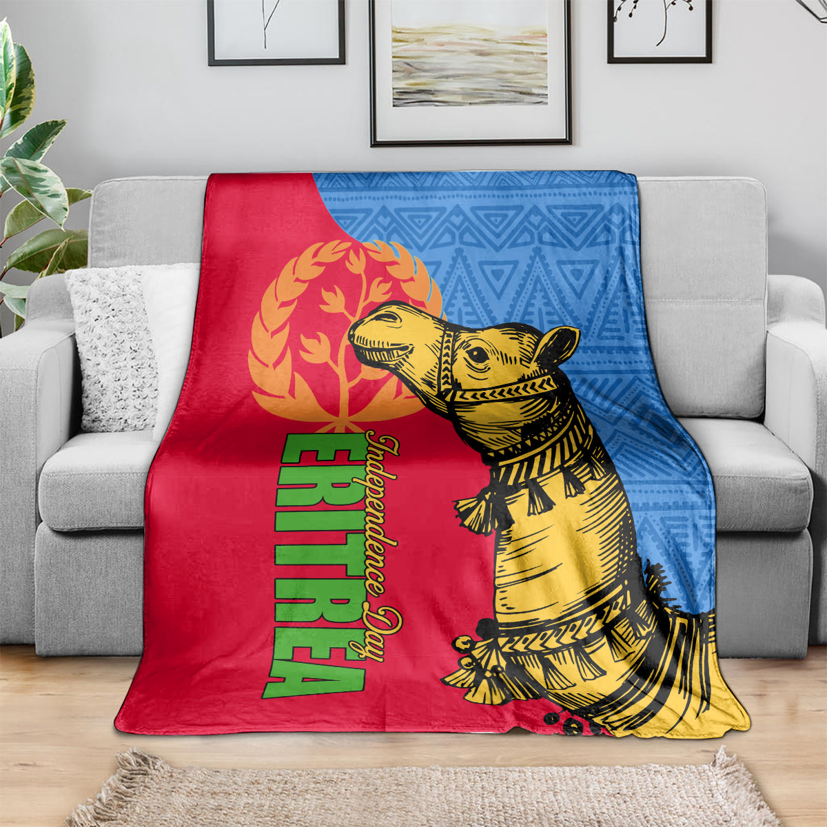 Eritrea Independence Day blanket on sofa, red and blue with gold camel graphic