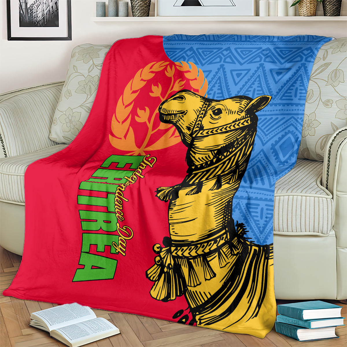 Eritrea Independence Day blanket over couch, red and blue panels with gold camel design