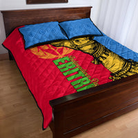 Quilt bed set with blue geometric fabric, red center with golden camel and green text