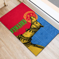 Rubber doormat featuring yellow camel graphic across red, blue, and yellow sections with green text