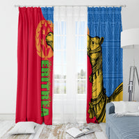 Two window curtain panels with red and blue halves and a central gold camel design