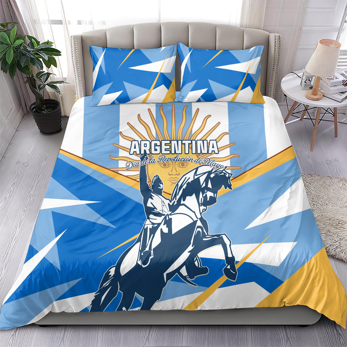 Blue Argentina-themed bedding set with geometric rays, rider graphic, and matching pillows.
