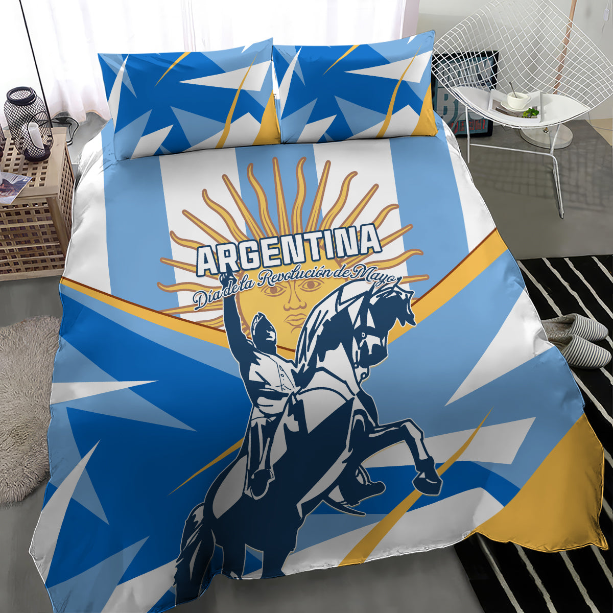 Blue Argentina-themed bedding set with rider graphic, geometric rays, and two coordinated pillows.