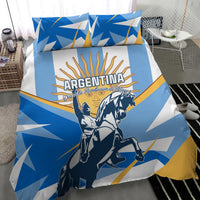Blue Argentina-themed bedding set with rider graphic, geometric rays, and two coordinated pillows.