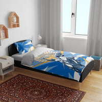 Blue Argentina Revolution Day bedding set with rider graphic and geometric rays on bed with pillows.