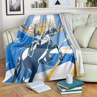Blue and white Argentina Revolution Day blanket with horse-and-rider graphic