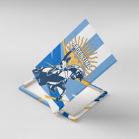 Blue canvas wall art angled view with Argentina text and horse-rider scene