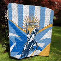 Argentina Revolution Day quilt with blue and white pattern, yellow accents, and rider artwork