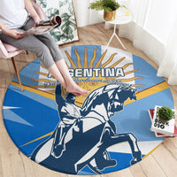Round blue carpet featuring an Argentina banner, mounted revolution warriors and golden rays