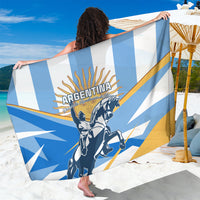 Argentina-themed blue striped sarong with warrior graphic, held up like a blanket