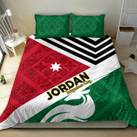 Bed quilt set with Jordan flag pattern, green and red blocks, and two matching pillowcases