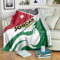 Jordan folk pattern blanket with black chevron stripes, red star triangle, green emblem