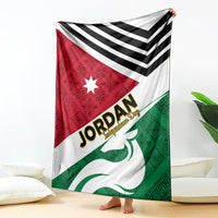 Jordan folk pattern blanket displayed with red star triangle, black chevrons, green emblem