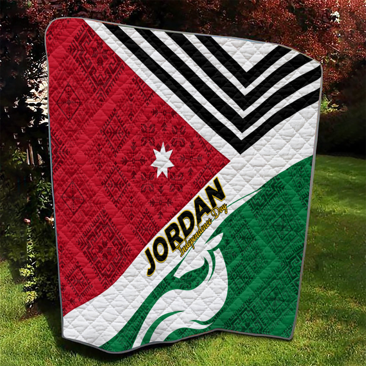 Jordan Independence Day quilt with star, red and green flag pattern, white zigzags