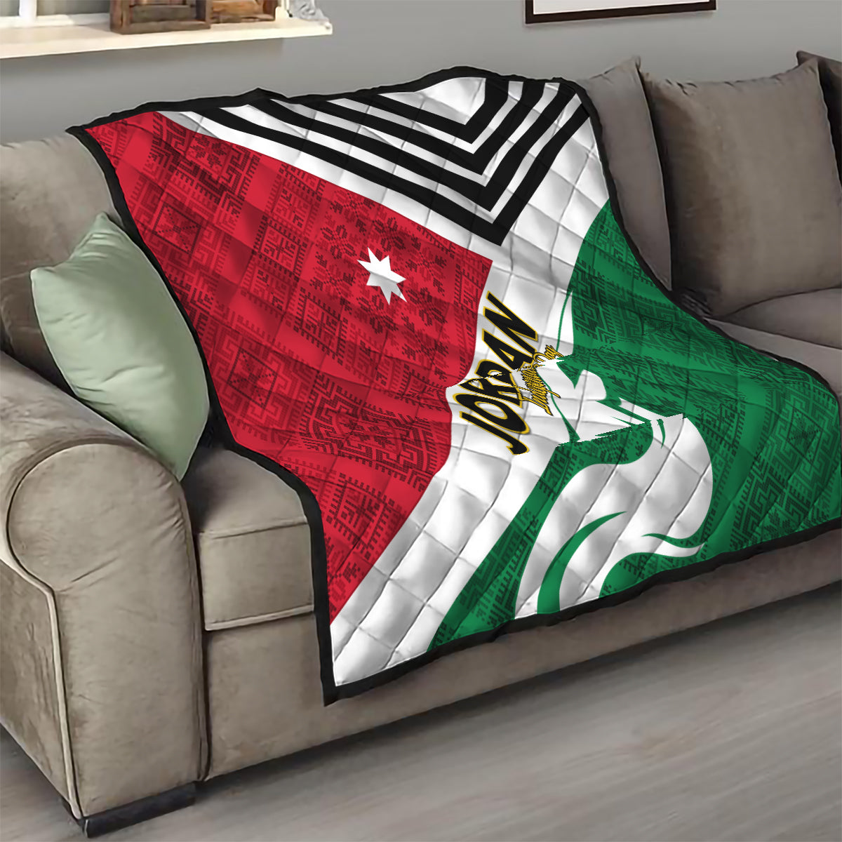 Jordan Independence Day quilt on sofa, red and green flag triangles with white zigzags and star