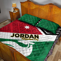 Quilt bed set in red, white, and green with star, bold 'JORDAN' text, two pillows