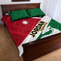 Quilt bed set with green and red patterned panels, white stripe section, two pillows