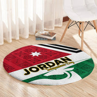 Round rug on the floor with red star, Jordan Independence Day text, and black stripes