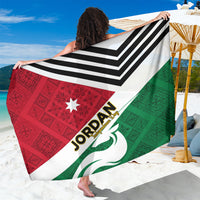 Jordan-themed sarong with red, green, and white panels and bold black chevron stripes