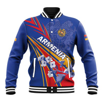 Blue baseball jacket with ribbed knit collar and cuffs, front snap buttons, graphic crest